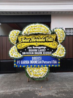 Papan Bunga Duka di Tauno