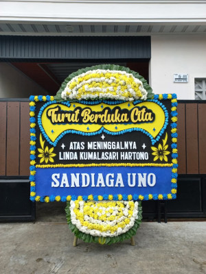 Papan Bunga Duka di Tauno