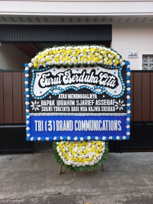 Papan Bunga Duka di Tauno